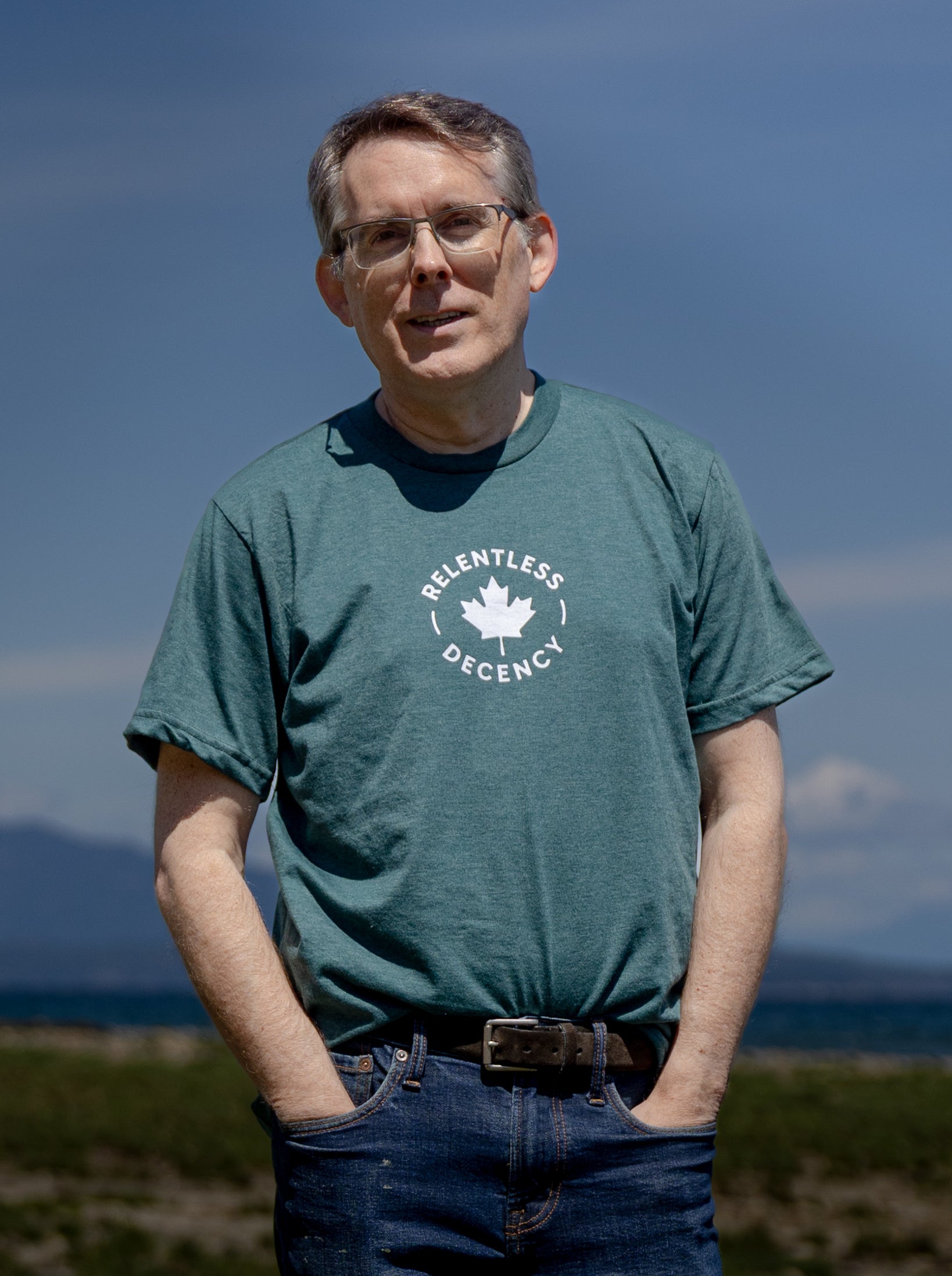 Tod Maffin's Relentless Decency - Unisex Eco Tee - Heather Green