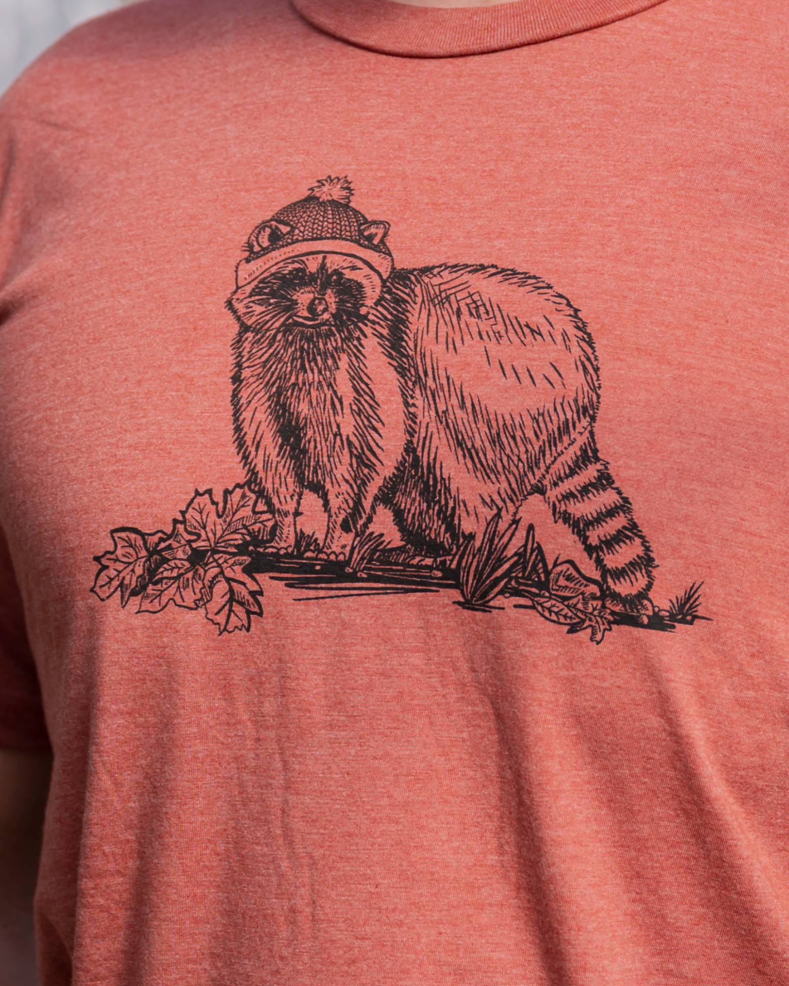 CANADIAN RACCOON- Unisex Eco Tee - Heather Rust